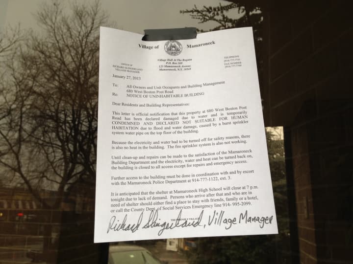 A notice posted at the entrance of 680 W. Boston Post Road in Mamaroneck says the building is uninhabitable.