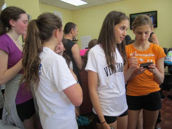 Briarcliff High School student Jordana Cohen, center, is organizing a second annual Spinathon this year to raise money for Pediatric Cancer research. 