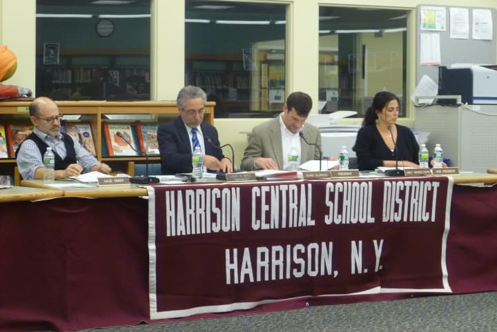 Superintendent Lou Wool brings up improved security measures in his report to the Harrison Board of Education on Wednesday night.