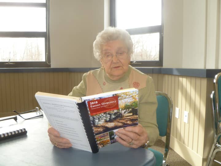 Anne Fiyalka, a Senior Center volunteer, is assisting with the preparation of the 2014 Easton Directory.