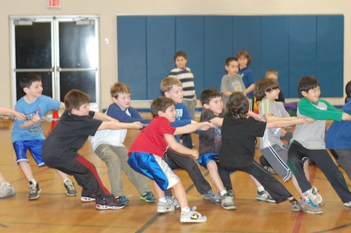 Edgemont students compete in the tug-of-war-match against their parents at last year&#x27;s Winter Warm-Up. This year&#x27;s event will be held Friday night at Greenville Elementary.