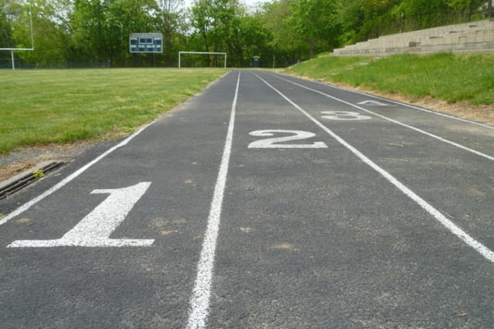 The rubber-surface track at Reynolds Field in Hastings is badly deteriorated and needs to be repaired or replaced.