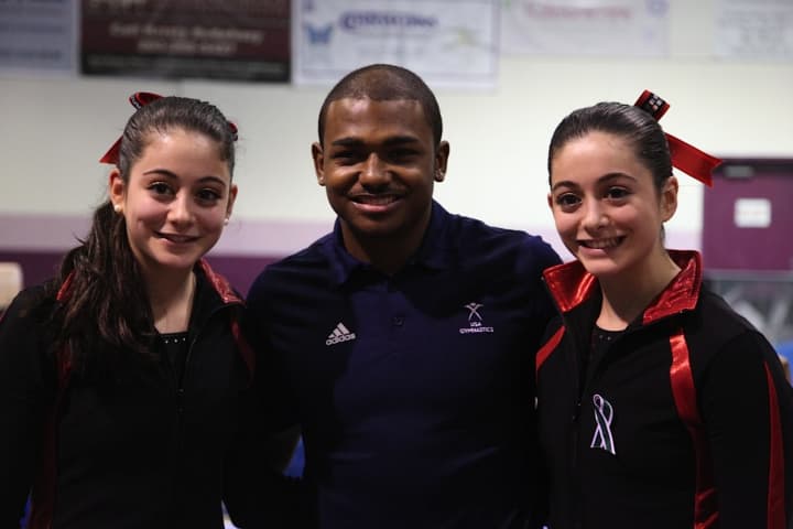 Westport&#x27;s Kristen Onorato, left, and her twin sister, Pamela, meet U.S. Olympic gymnast John Orozco at Arena Gymnastics in Stamford.