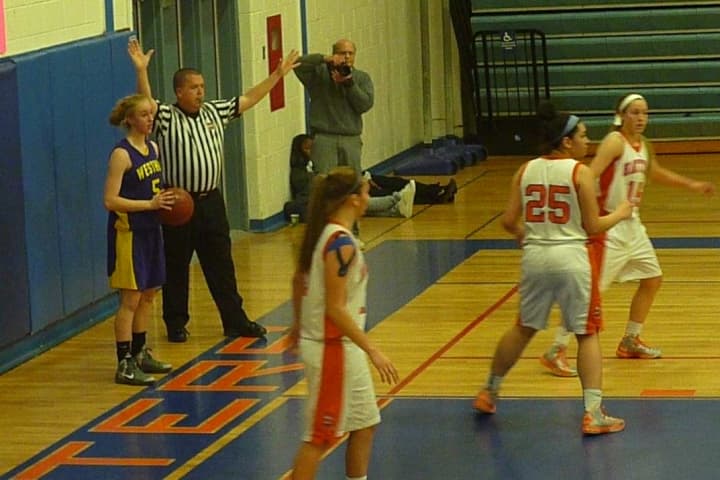 Westhill&#x27;s Steph Roones looks to make an inbounds pass against Danbury on Tuesday night.