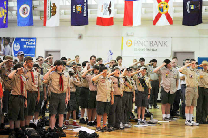 The Boy Scouts of America&#x27;s executive board has put off its decision on whether to lift a ban on gay members. Some Scouts are seen here at a Texas meeting.
