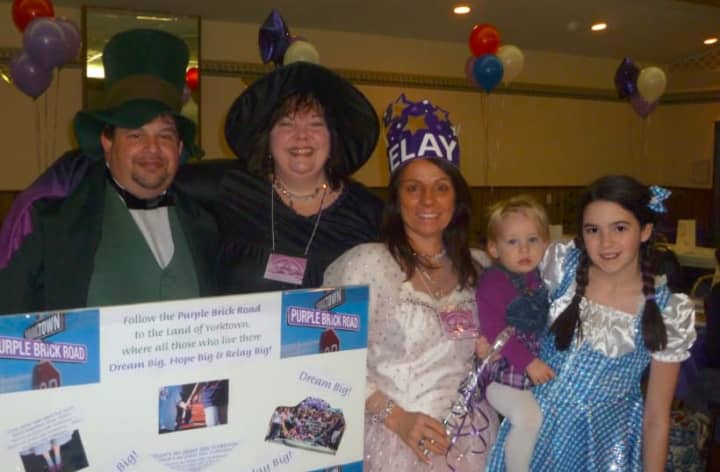 From L-R: Jim Poulin (The Wizard of Oz), co-chair Jane McCarthy (The &quot;Purple Power&quot; Witch), co-chair Donna D&#x27;andrea (Glinda), Madison Black, Michaela Garrigan (Dorothy).