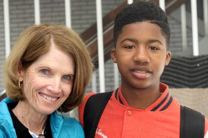 Nancy McKenna poses with a Destination College student athlete. The Bronxville-based organization works with students in Mount Vernon, Hartsdale and Yonkers.