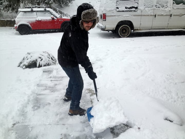 A Cortlandt resident shoveling snow Friday. 