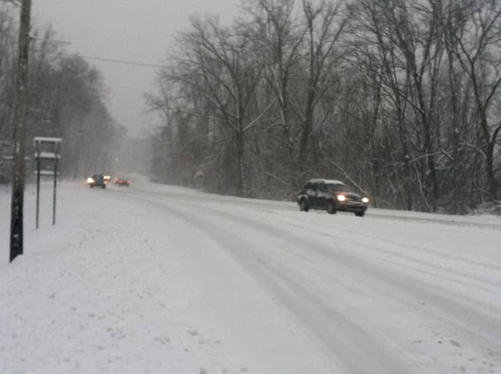 Cars drive slowly on Route 9 in Ossining Friday afternoon. 