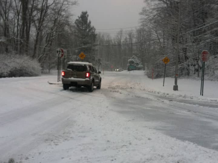 A private snow plow operator suffered minor injuries in Rye Brook during Tuesday&#x27;s blizzard. He was ticketed for driving an uninsured, unregistered motor vehicle, police said.