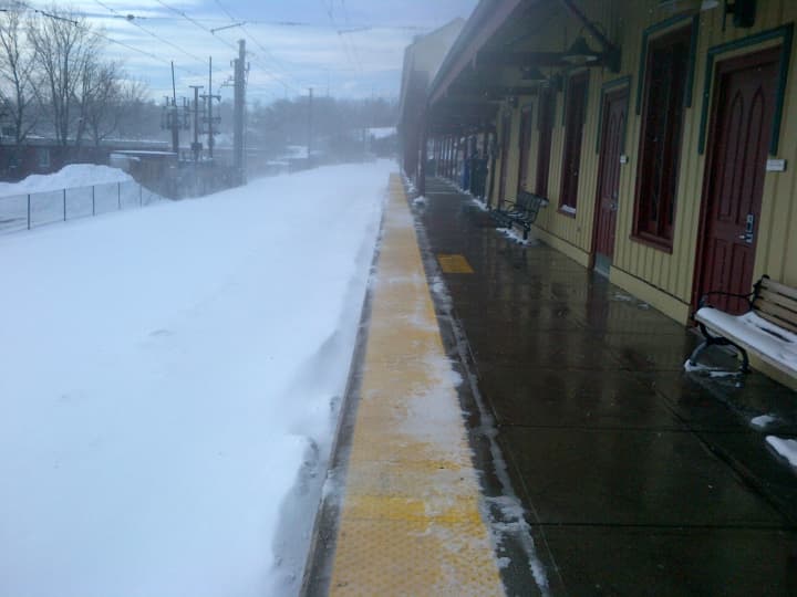 Metro-North train tracks were buried under snow at the New Canaan train station. 