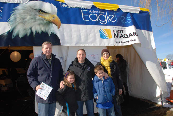 Westchester County Executive Rob Astorino and his two children pose with David Ring, Managing Director of Enterprise Banking for First Niagara, a Yorktown resident (L), and Naomi Marrow, chair of the Teatown Board at Teatown&#x27;s EagleFest Sunday.
