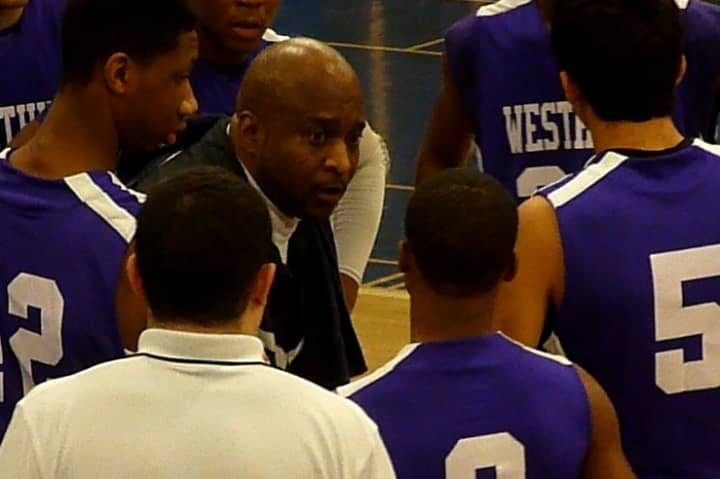 Westhill boys&#x27; basketball coach Howard White talks to his team during a timeout during Friday&#x27;s game against Staples.