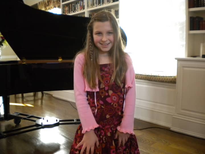 Nine-year-old Chappaqua resident Erica Lauren Dunne won a 2012 Certificate of Excellence from the Royal Conservatory Music Development Program for her performance on the piano. 
