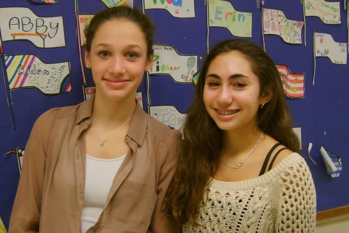 A video created by Westport eighth-graders Emily Schusssheim (left) and Renee Weisz is a finalist in a national contest.