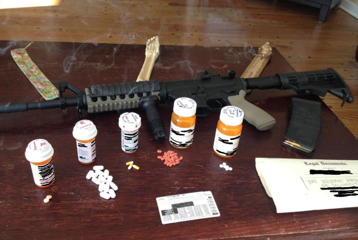 Wilton Police found a loaded assault rifle and prescription drugs in a Wilton home on Wednesday following a standoff with a man in a home in the area of Hulda Hill Road. 