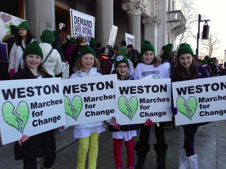 Weston students march for change at the capitol building in Hartford. From left: Hannah Daniels, Ellie Daniels, Jessica Kripke, Raya Greenberger, Alexa Kripke.