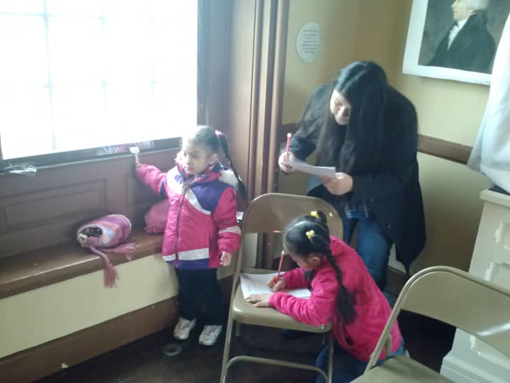 Socorro Tzompantzi and her children take part in a scavenger hunt for President&#x27;s Day at Philipse Manor in Yonkers.