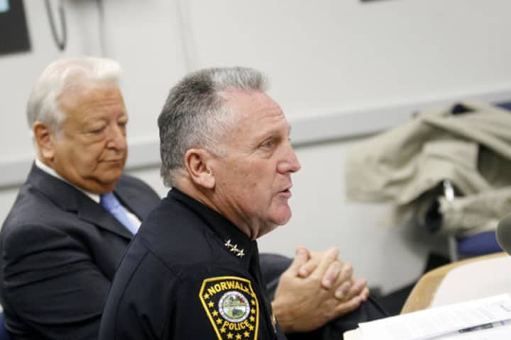 Former Norwalk Police Chief Harry Rilling, foreground, reportedly is preparing to run for mayor of the city as a Democrat. If he wins his party&#x27;s nomination, he would face incumbent Republican Mayor Richard Moccia, left.