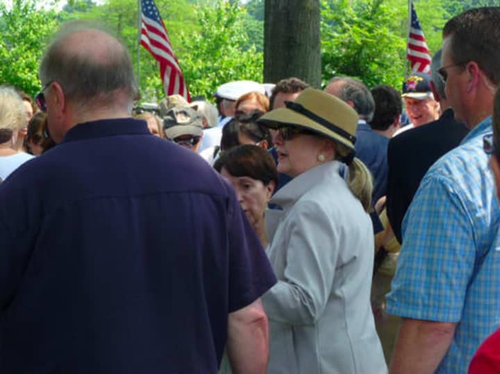 Chappaqua resident and former Secretary of State Hillary Clinton, seen here at New Castle&#x27;s Memorial Day Parade last summer, will be joining the paid speaking circuit with the Harry Walker Agency.