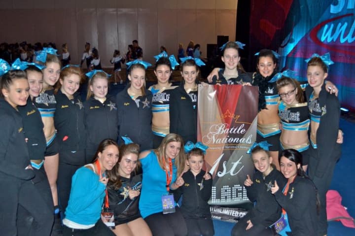 Chaos, a cheerleading team from Stamford-based Gold Coast All-Stars, won national championship and Grand Level national championship honors at a recent competition in New Jersey.