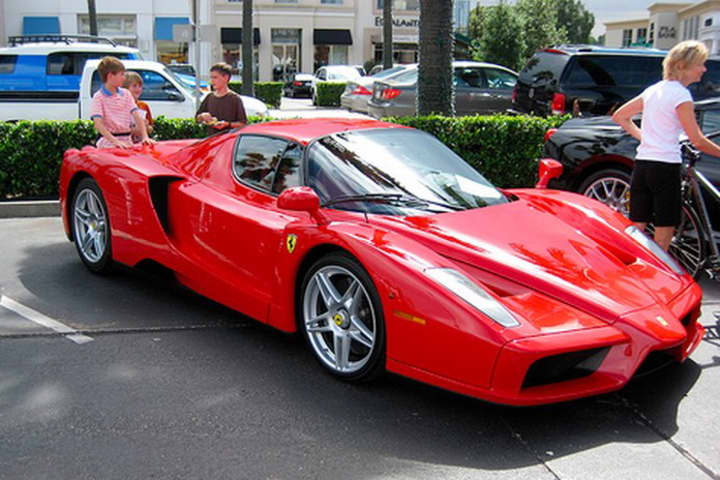 A pair of 2003 Ferrari Enzos - one owned by Tommy Hilfiger - are the highest-assessed cars in Greenwich, according to the tax assessor&#x27;s office.