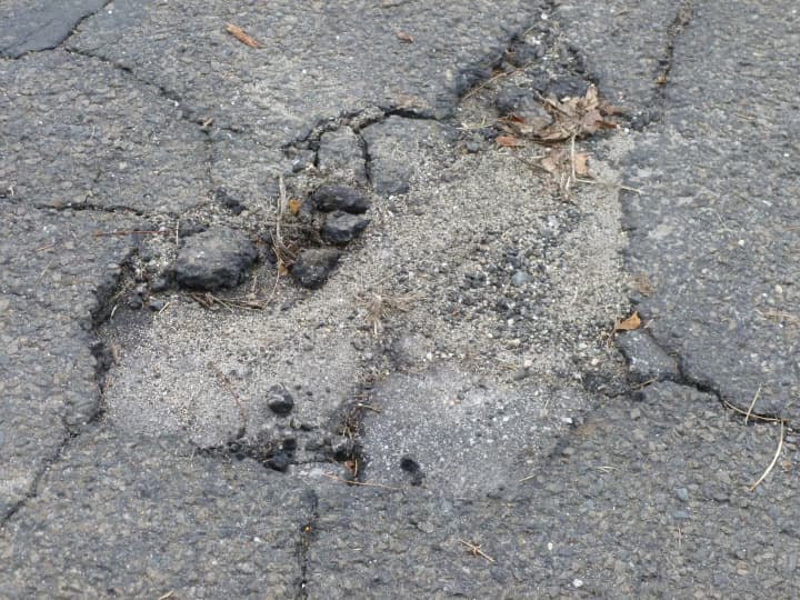 This is one of the many potholes on Norwalk streets. 
