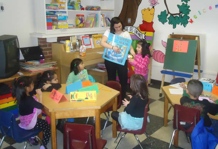 First-graders read &quot;big&quot; books and craft their own story ideas at the Center for Literacy Enrichment in White Plains.