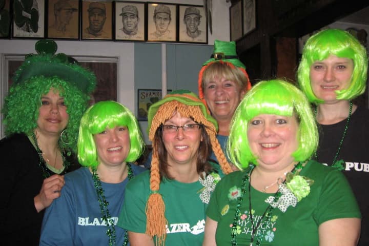 The waitresses at Blazer Pub in Purdys will serve up beer and corned beef at this weekend&#x27;s St. Patrick&#x27;s Day auction.