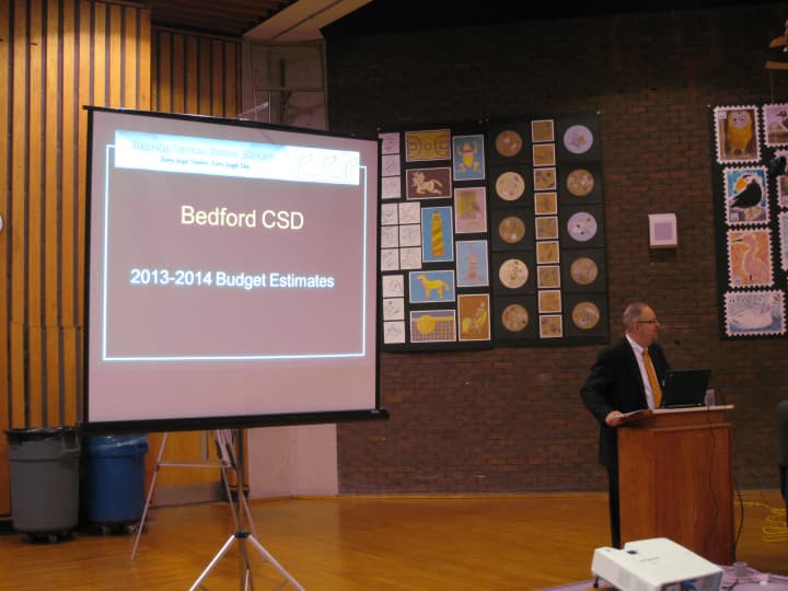 Bedford Central School District Assistant Superintendent Mark Betz helps present a preliminary 2013-14 school district budget.