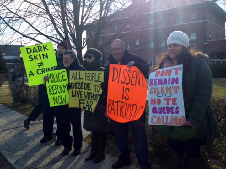 Racial justice and police reform advocates rallied in front of Village Hall in Mamaroneck.