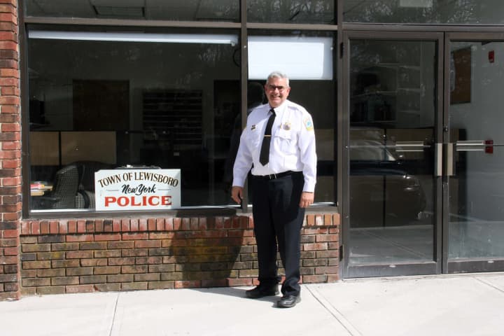 Lewisboro Police Chief Frank Secret stands in front of the new Cross River station.
