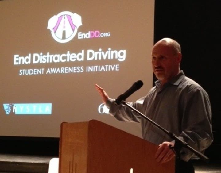 Chappaqua resident Rob Greenstein speaks to more than 200 Horace Greeley High School students and parents Tuesday night about distracted driving.