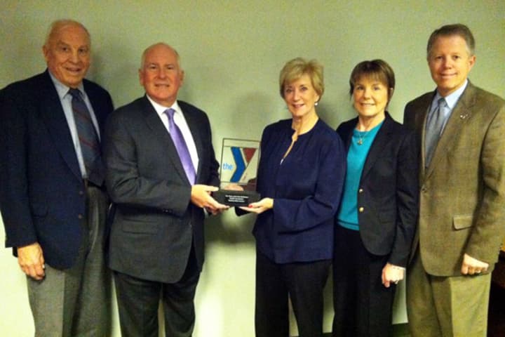 Westport Weston Family Y officials present Linda McMahon, third right, with a thank-you gift for her foundation&#x27;s $1 million donation to the new Y facility. 