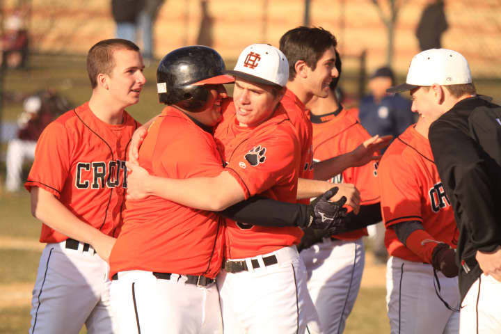 Tom Syku (5) hugs Chris Dreier in the midst of Croton&#x27;s seven-run rally in the fourth inning Tuesday.  