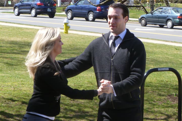Thomas Varian, right, dances with Kelly Butler in front of Greenwich Town Hall to commemorate &quot;Arthur Murray Day.&quot;