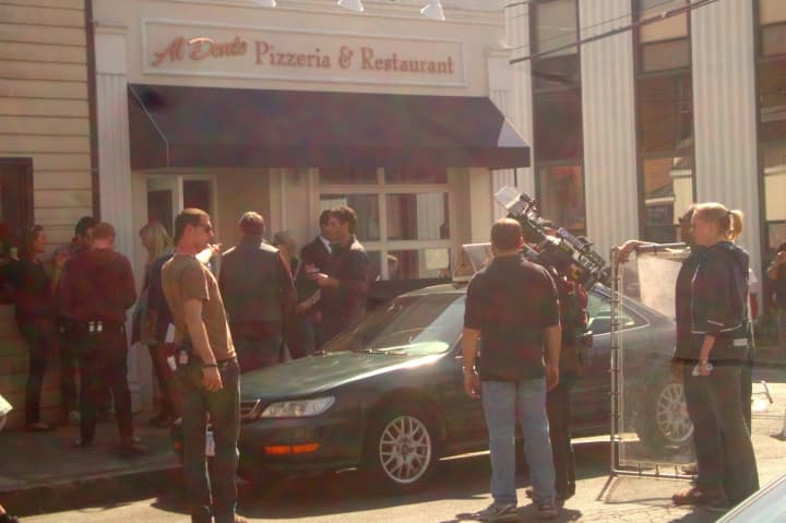 Crews prepare to film a scene for &quot;Law &amp; Order: SVU&quot; on Elm Place in Rye on Monday afternoon.