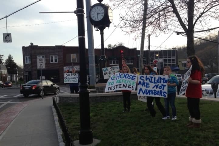 Several Elmsford parents and students took to the streets Tuesday evening to protest state testing.