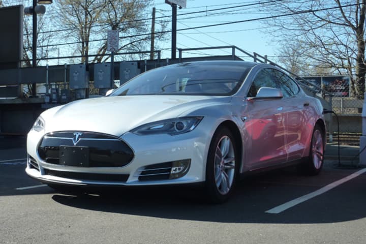 A Tesla, similar to this one seen charging-up at the Westport train station, will be among the various electric cars seen in Westport and Fairfield during the first annual Westport Electric Car Club EV Road Rally.