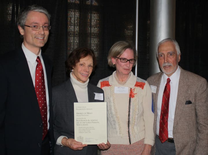 William Earls, Janet Lindstrom, Helen Higgins and Tom Nissley with the Merit Award for Physical Preservation given to the Gores Pavilion in New Canaan. 
