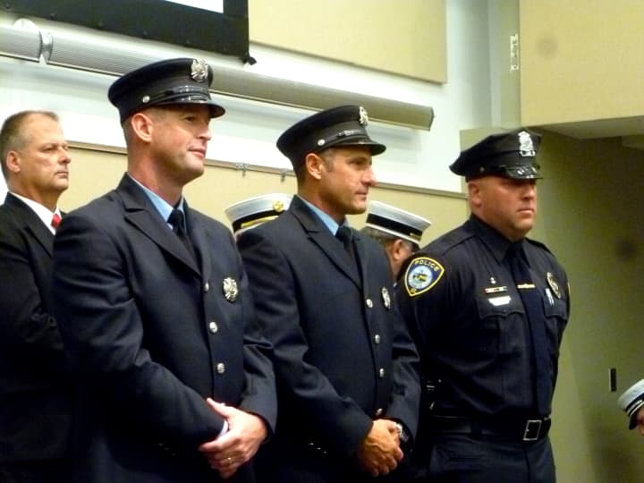 Stamford Firefighter William O&#x27;Connell (Left) received a national award for rescuing two people trapped in a capsized boat, he is seen here fellow firefighter Joseph Maida and Darien Police Officer Dan Ehret who also helped in the rescue. 