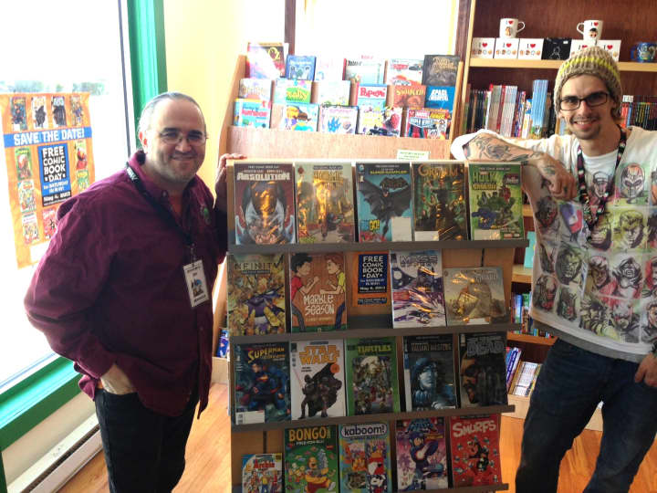 Jim Crocker, manager of Modern Myths in Mamaroneck, preps for Free Comic Book Day Saturday.