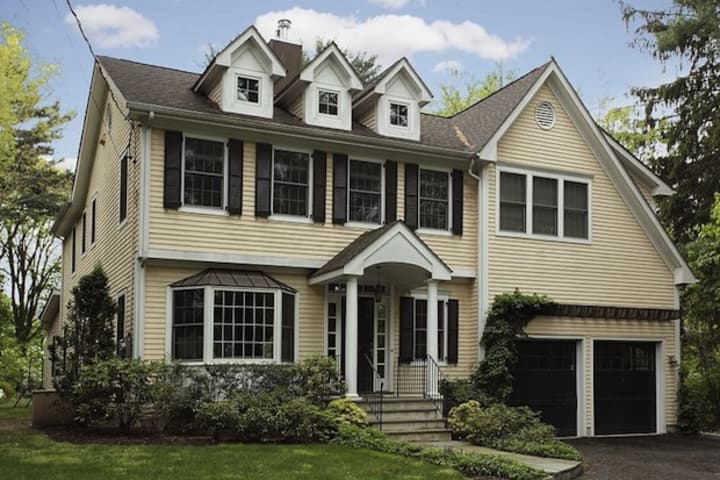This home on Woodland Drive in Rye Brook is one of several open houses this weekend. Open house is Sunday from 1 to 4 p.m.