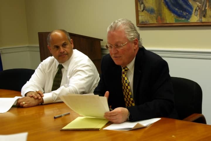 Fairfield First Selectman Michael Tetreau (right) and Public Works Director Joseph Michelangelo speak at a press conference about the 2013-2014 budget Friday.