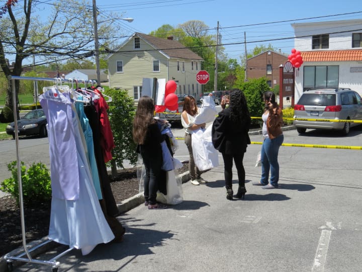 Excited shoppers perused what was left of the dresses in Eastchester after less than an hour.