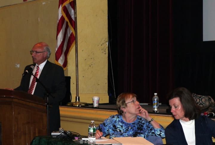 Ridgefield First Selectman Rudy Marconi with Town Clerk Barbara Serfilippi and Selectman Maureen Kozlark are on hand to answer questions regarding the town budget Monday night at the Annual Town Meeting.