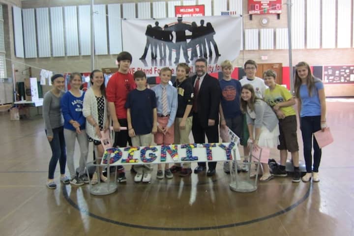 Rye Middle School students gather in the gym for a day of activities celebrating dignity, respect and diversity.