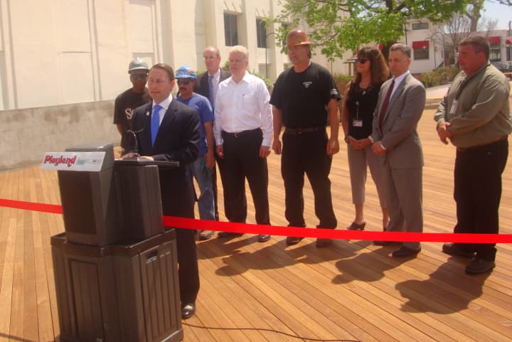 <p>County Executive Rob Astorino, along with members of Titan Construction and other county officials, celebrate the opening of the boardwalk at Rye Playland.</p>
