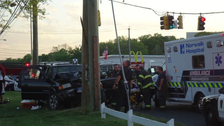 Emergency personnel respond to a two-car accident at Connecticut and Richards avenues in Norwalk on Thursday that sent four women to Norwalk Hospital.