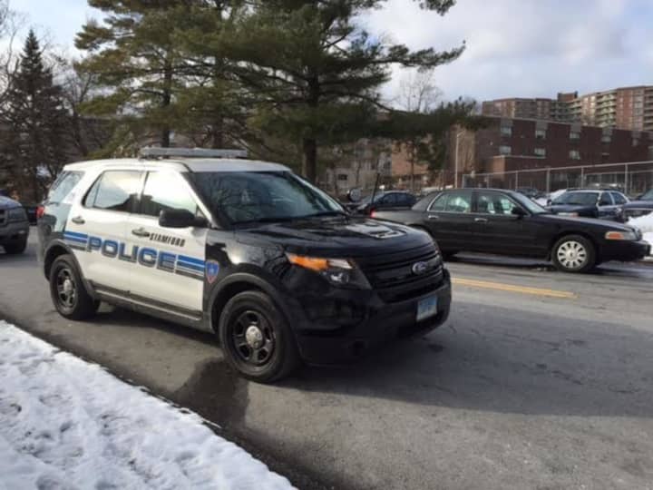 Stamford police respond in force to Stamford High School after a report of an active shooter.